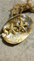 Starfish gold earrings
